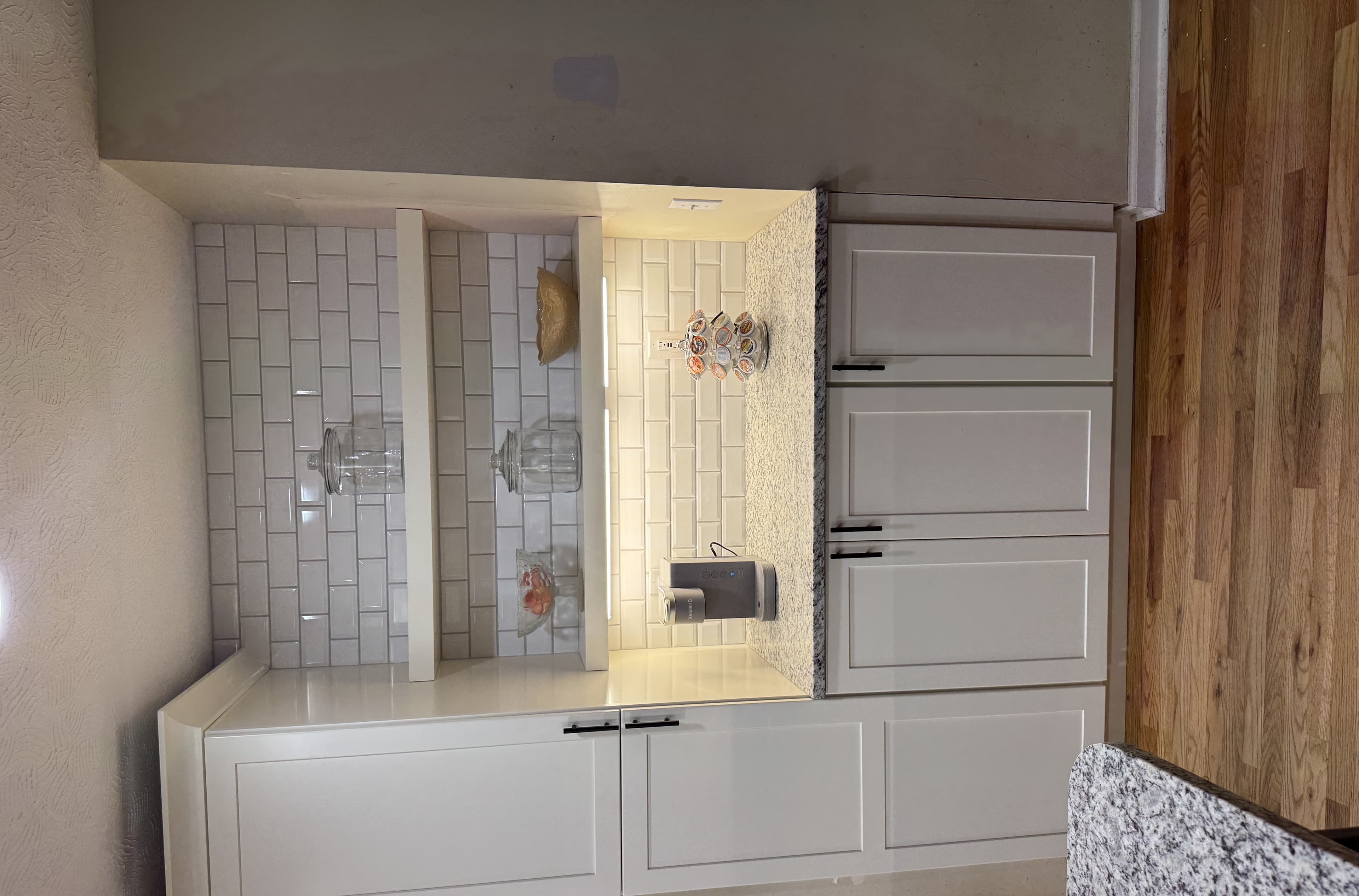 Coffee bar detail with open shelves and subway tile — S&T Construction remodel
